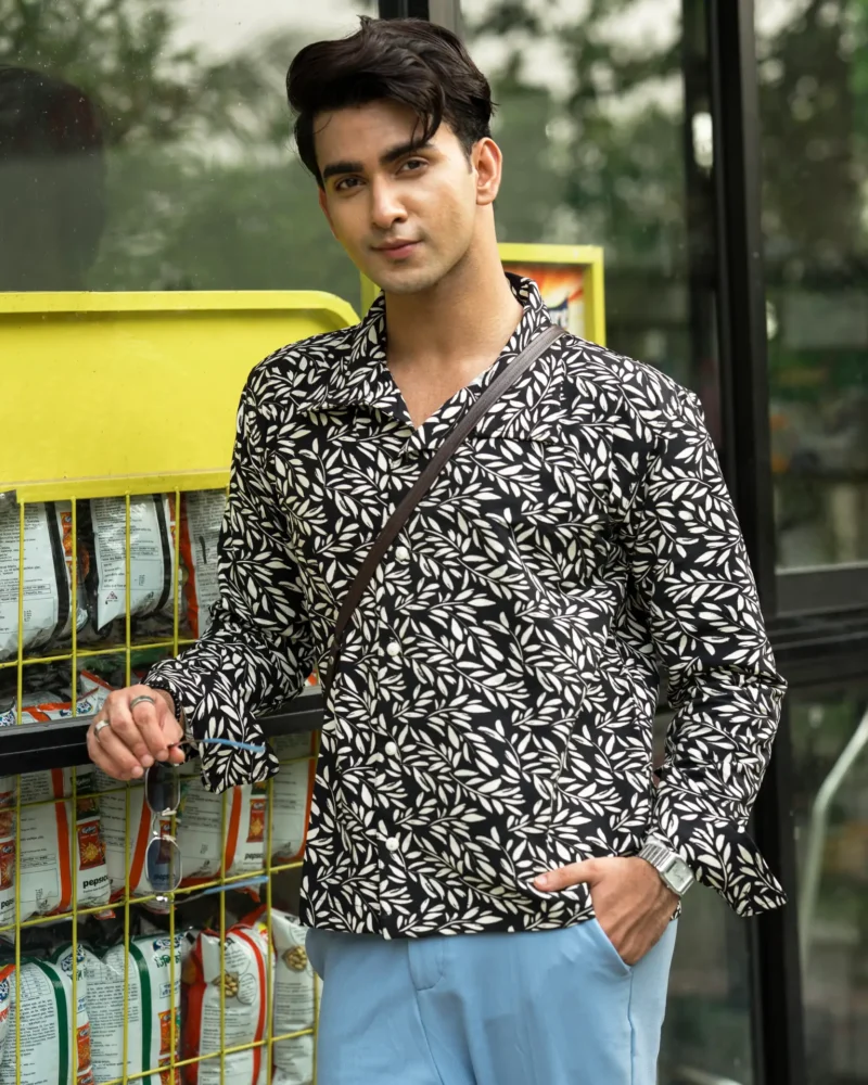 Men’s black and white leaf-print shirt worn by a model